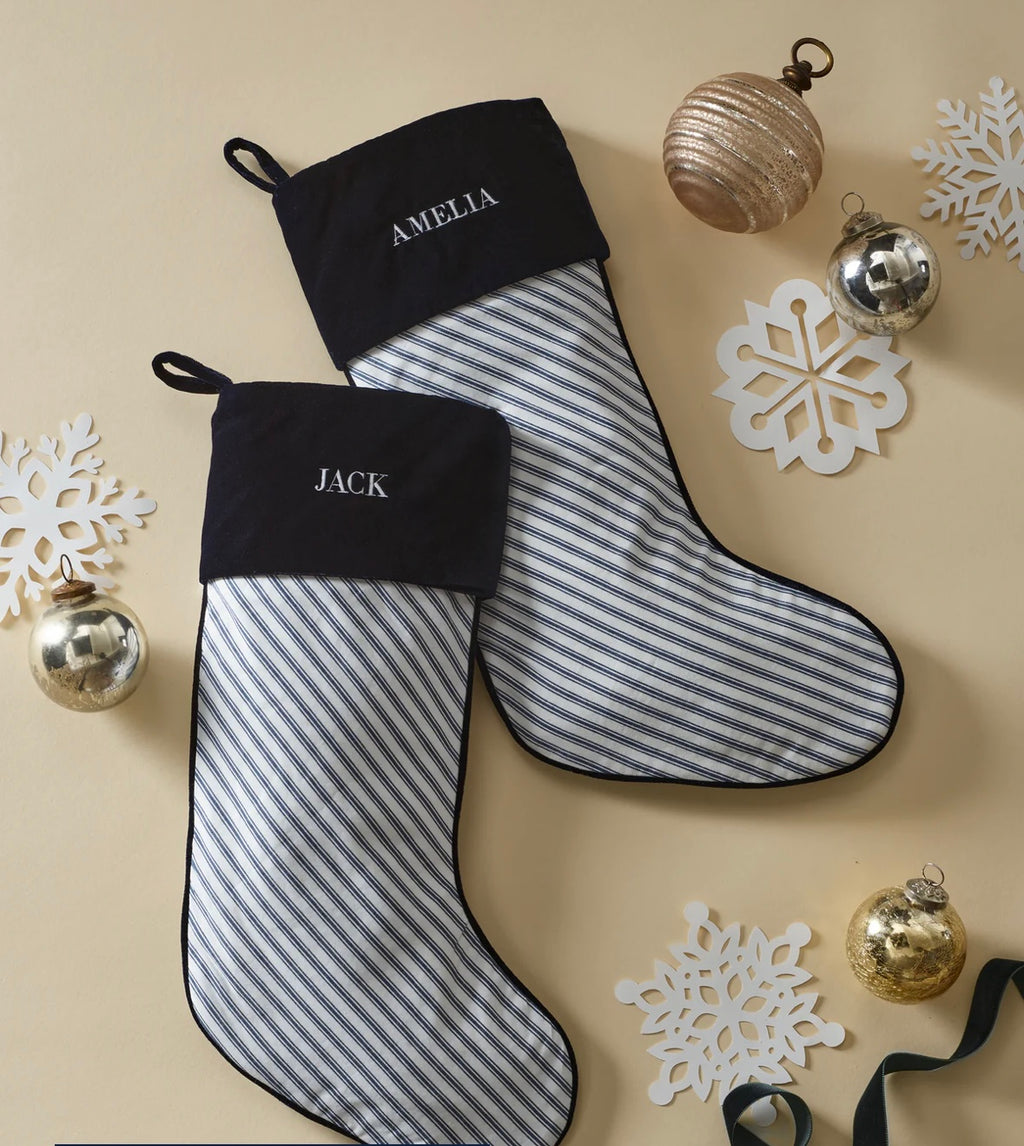 Discover timeless charm with our cotton Christmas stocking featuring a plush velour cuff. Choose from 3 plaid prints. Add a monogram for the perfect holiday gift!